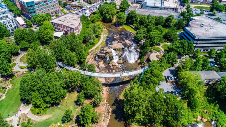 Falls Park and Liberty Bridge Aerial in Downtown Greenville Sout
